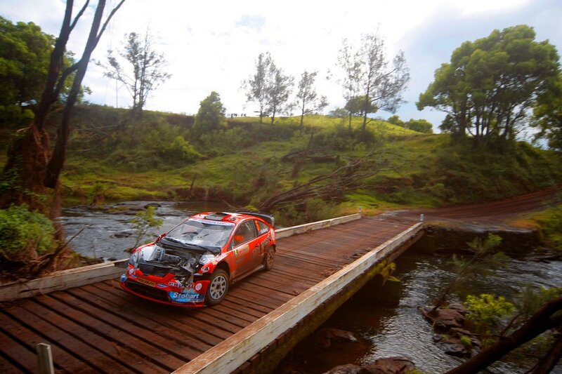 Rally car on wooden bridge