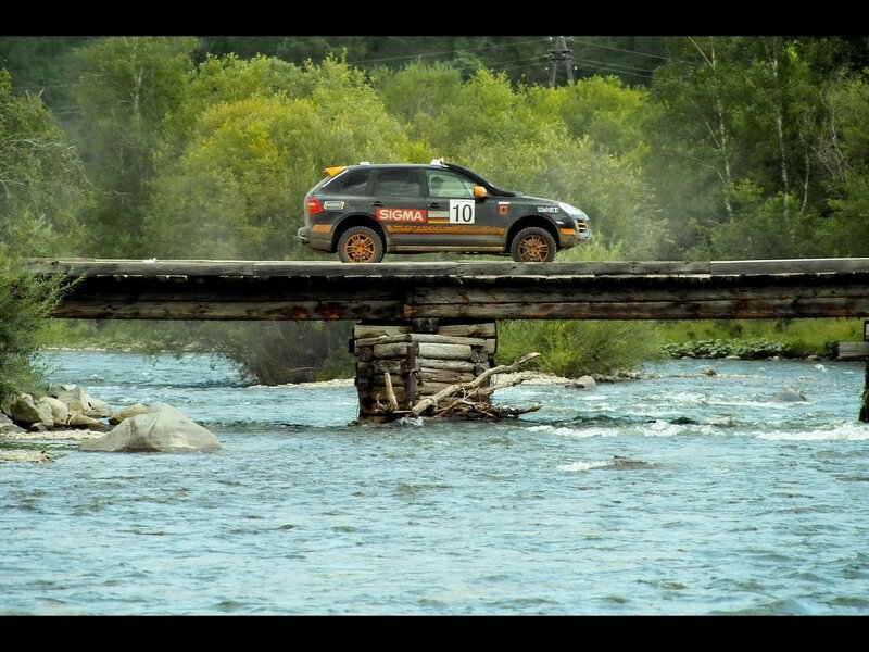 Rally car on wooden bridge