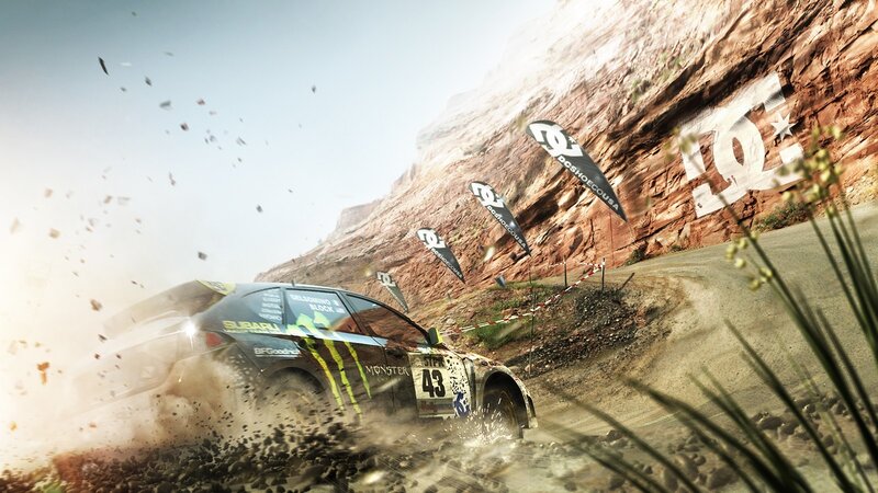 Rally car racing on dirt track