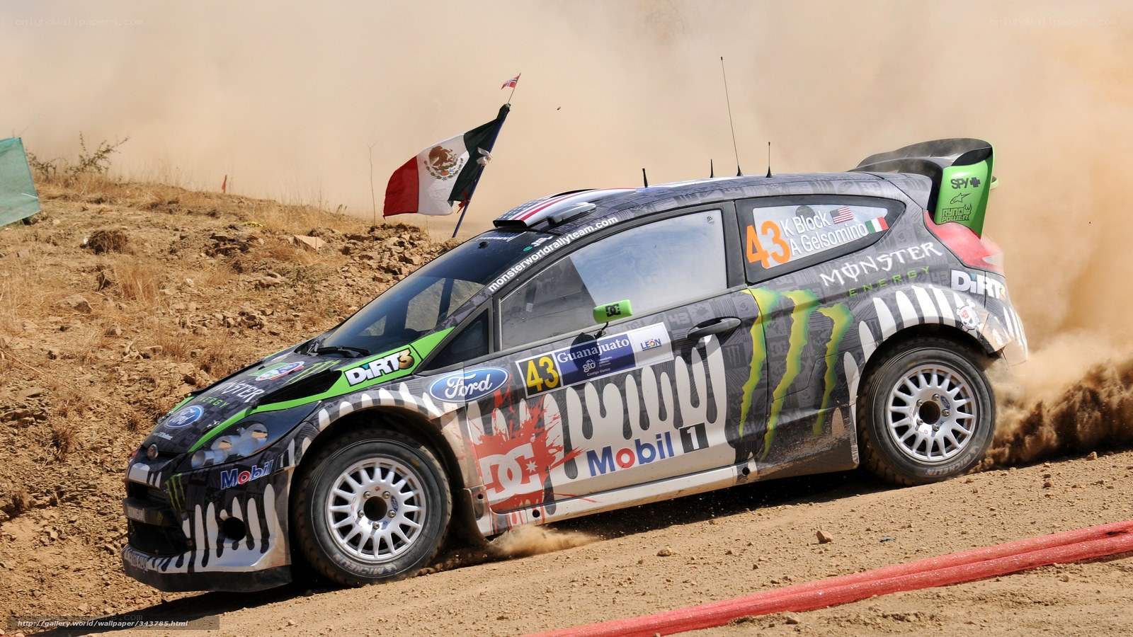 Rally car racing on dirt