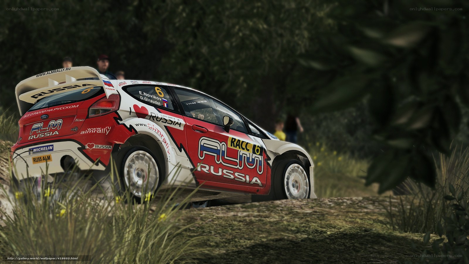 Rally car racing through forest