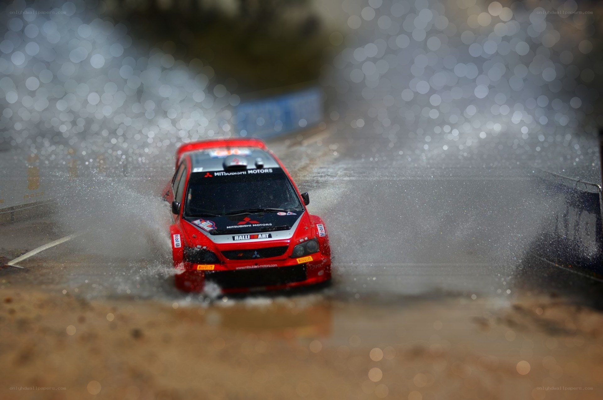 Rally car splashing through water