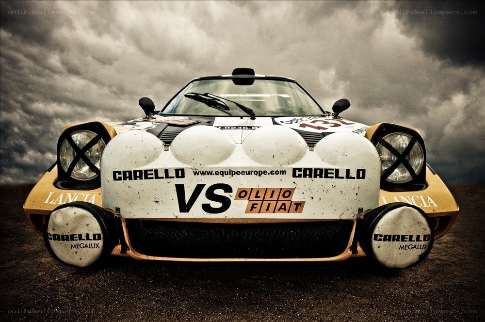 rally car under stormy sky