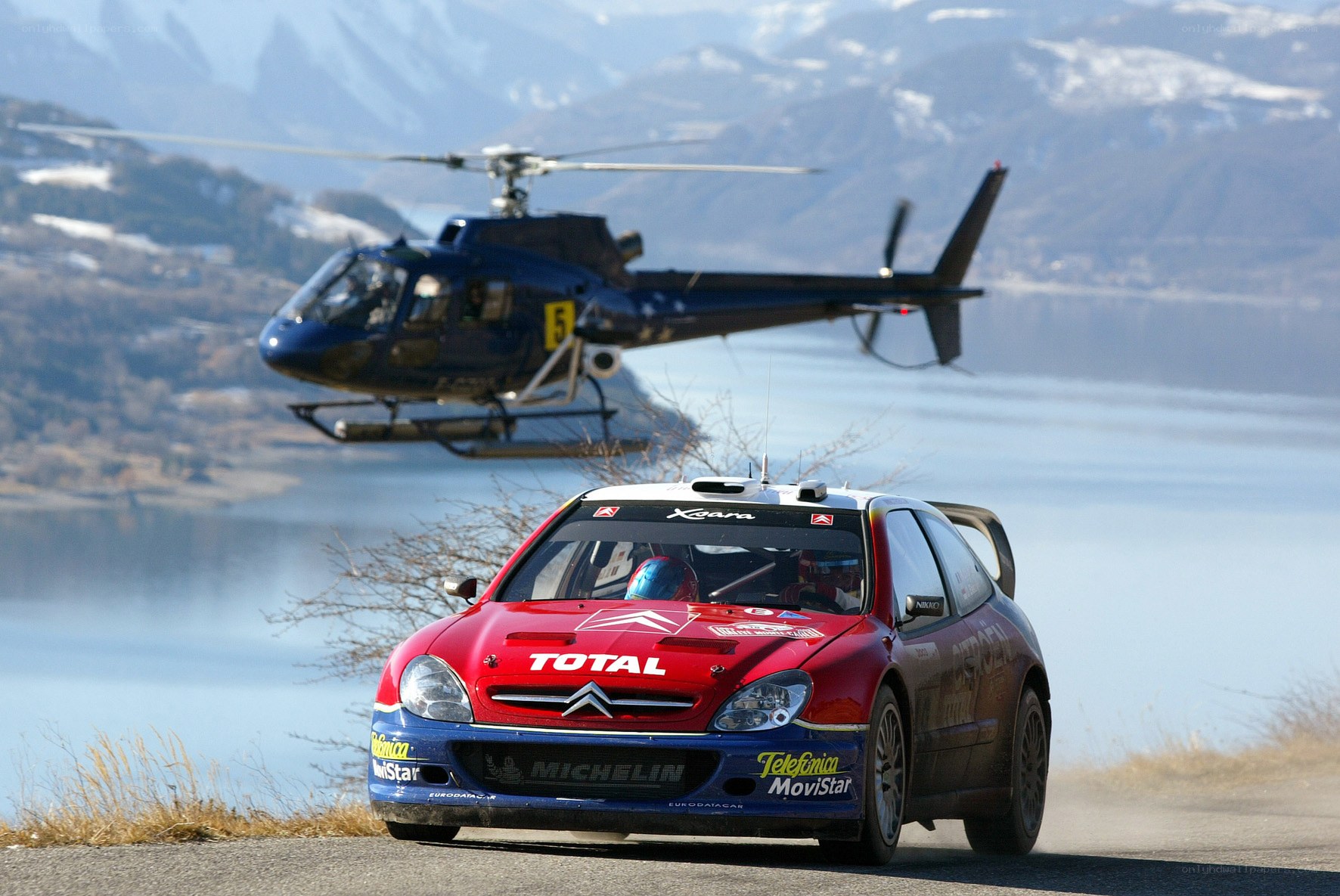 Rally car with helicopter