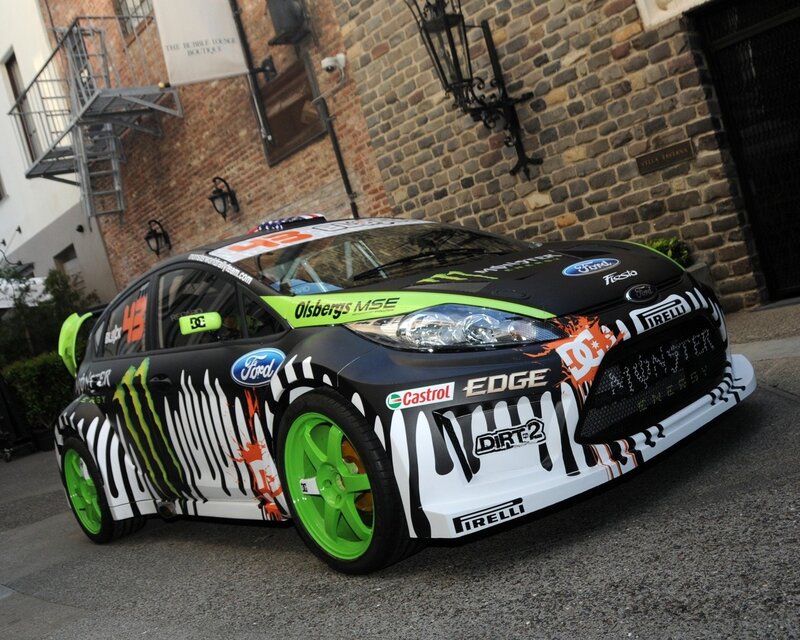 rally car with monster energy livery