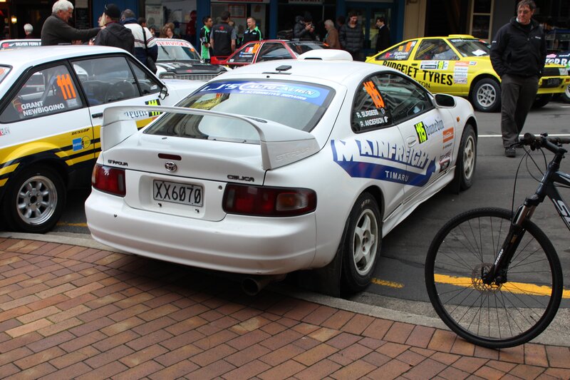 Rally cars at a public event