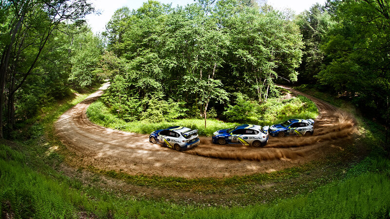 Rally cars on dirt track