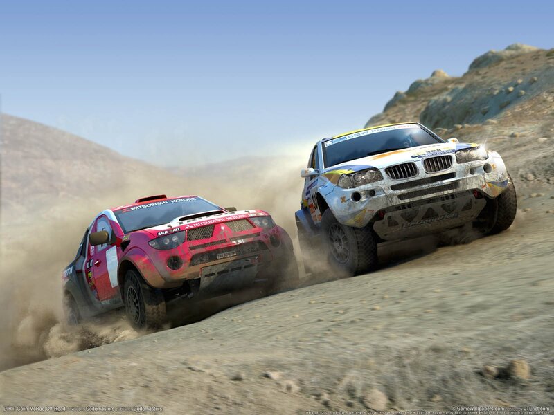 Rally cars racing on dirt