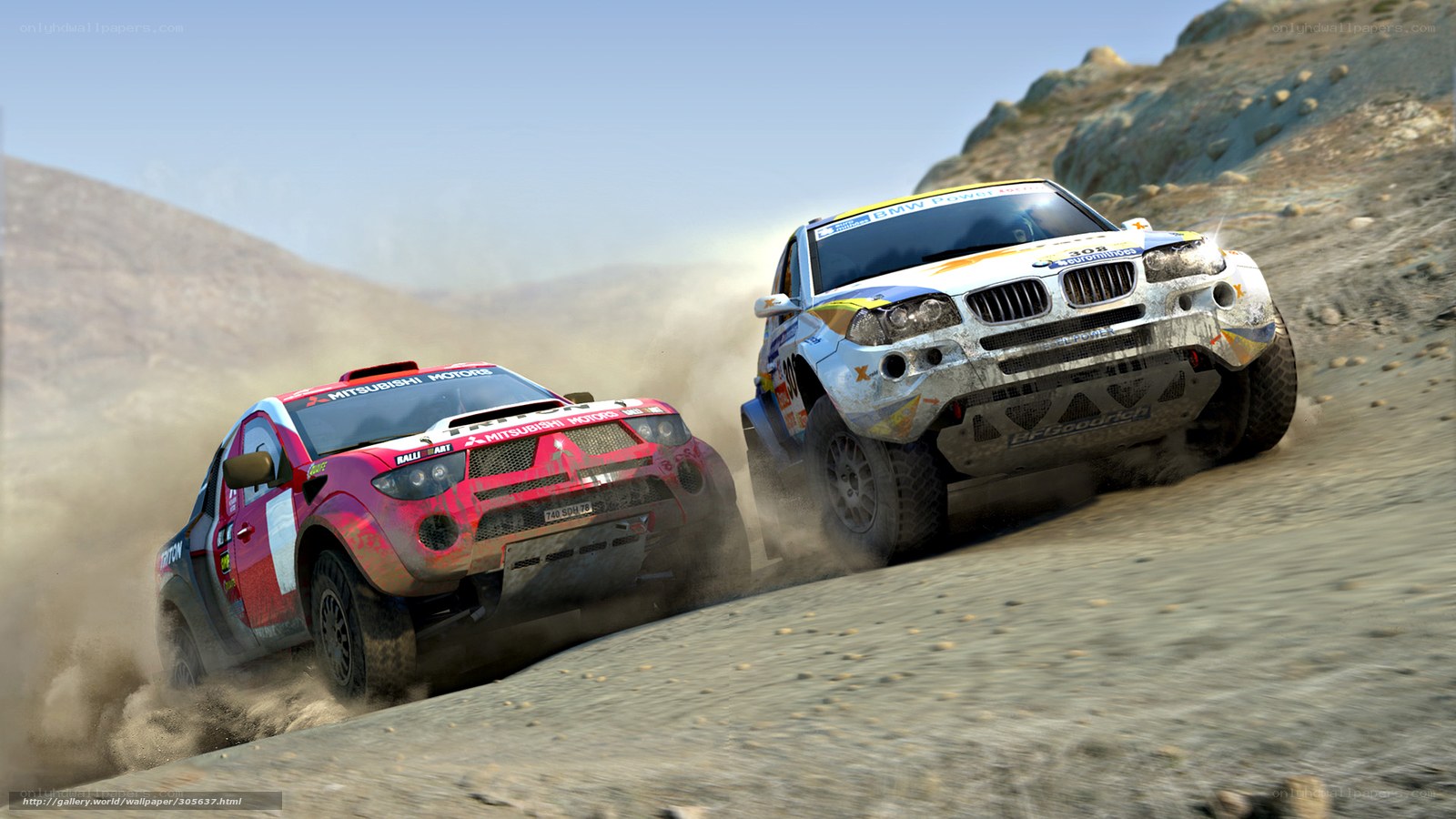 Rally cars racing on dirt