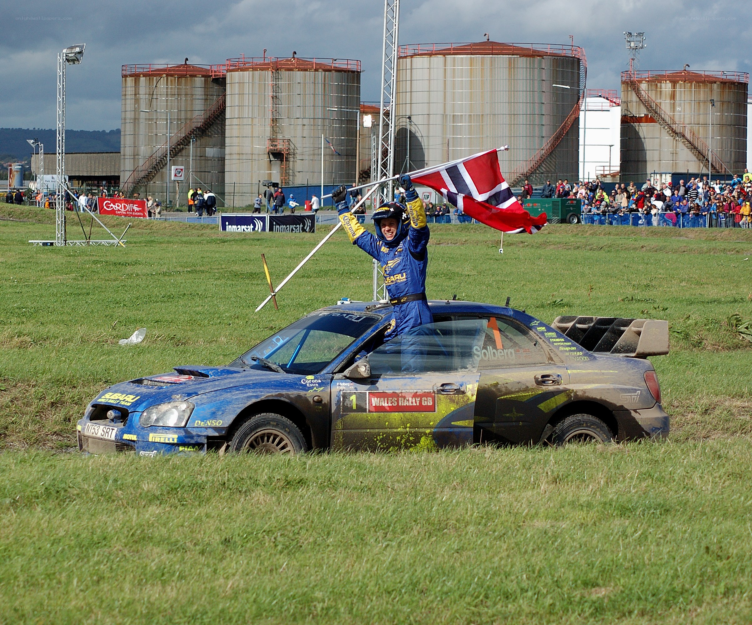 Rally driver celebrates victory