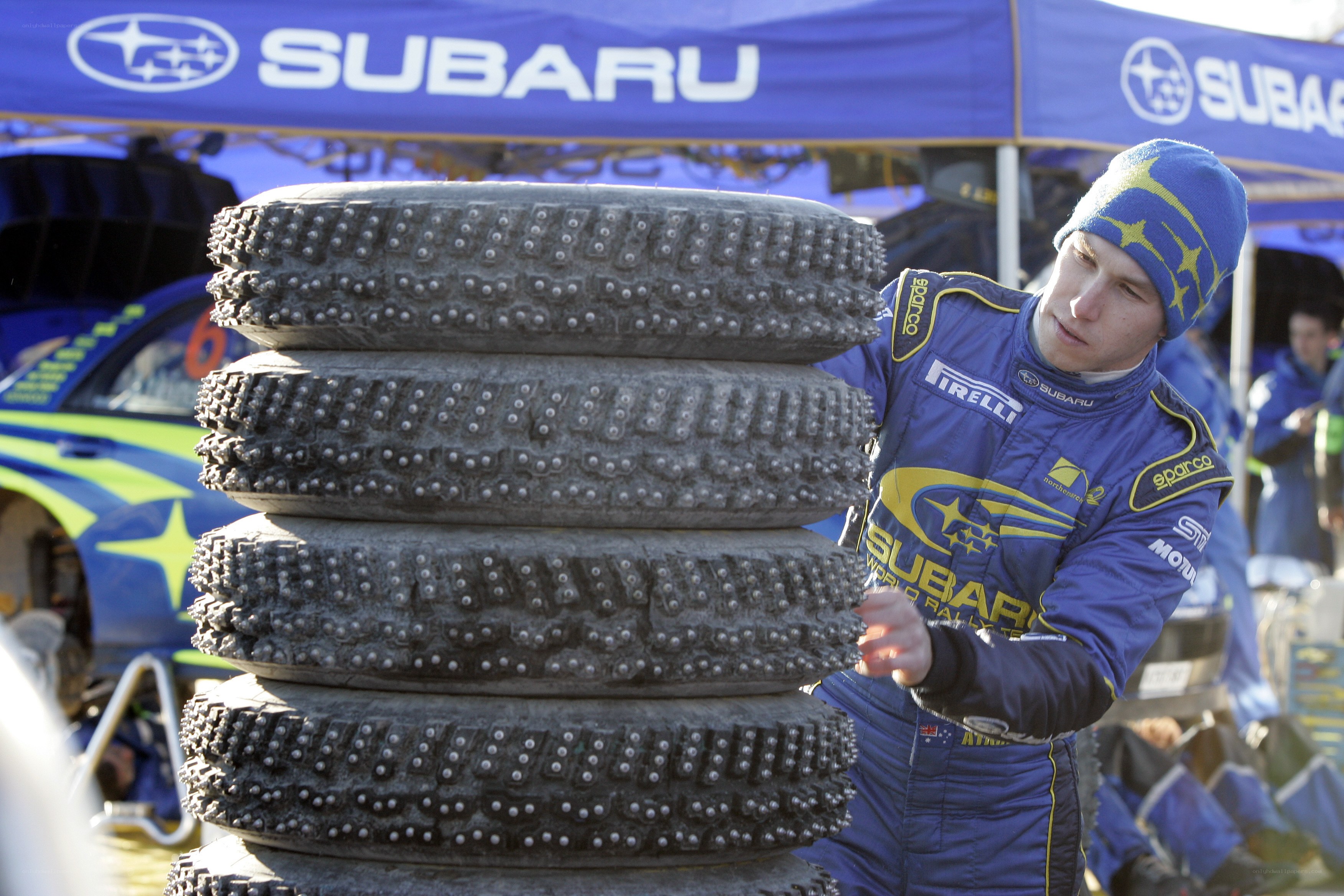 rally driver with tires