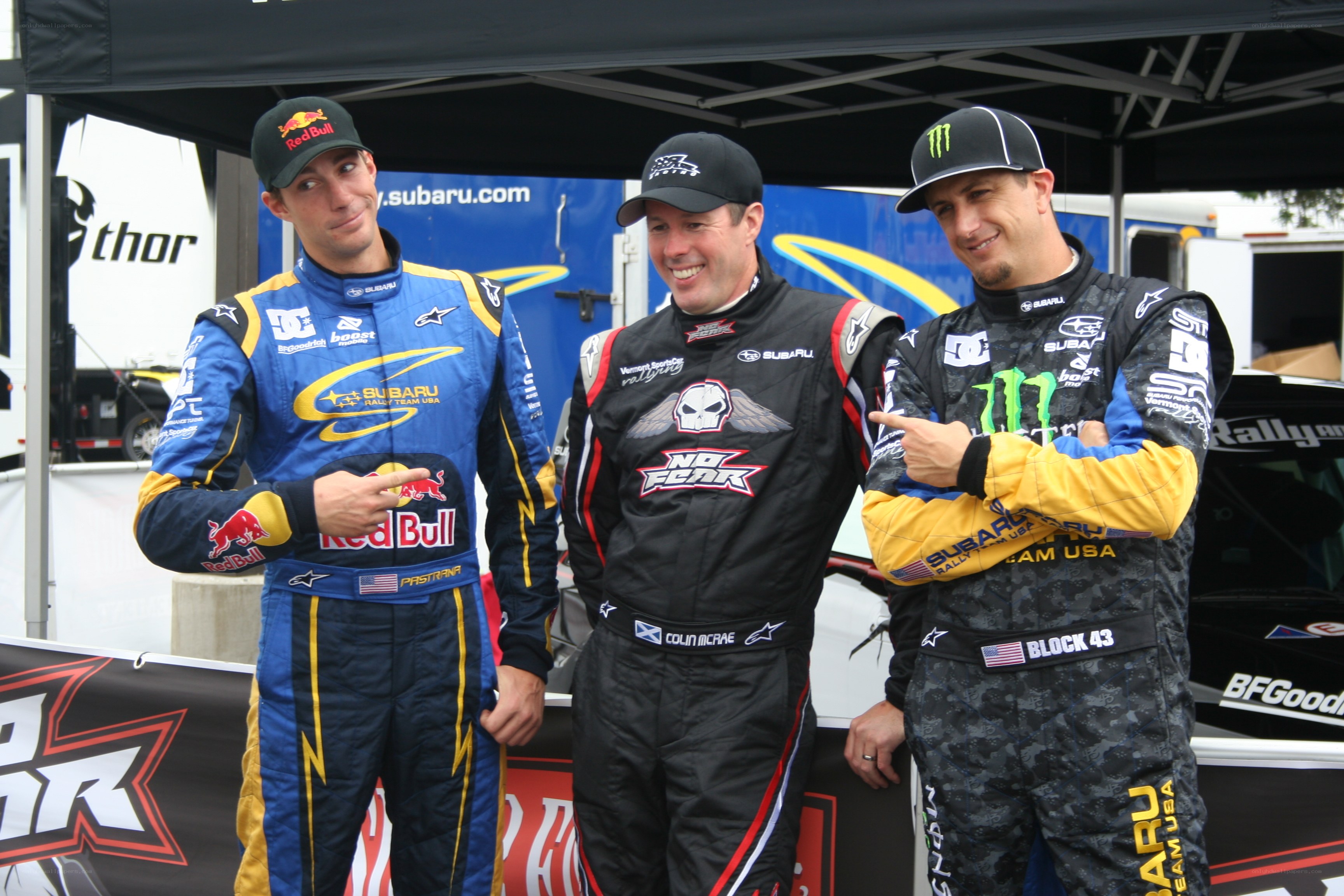 rally drivers posing together