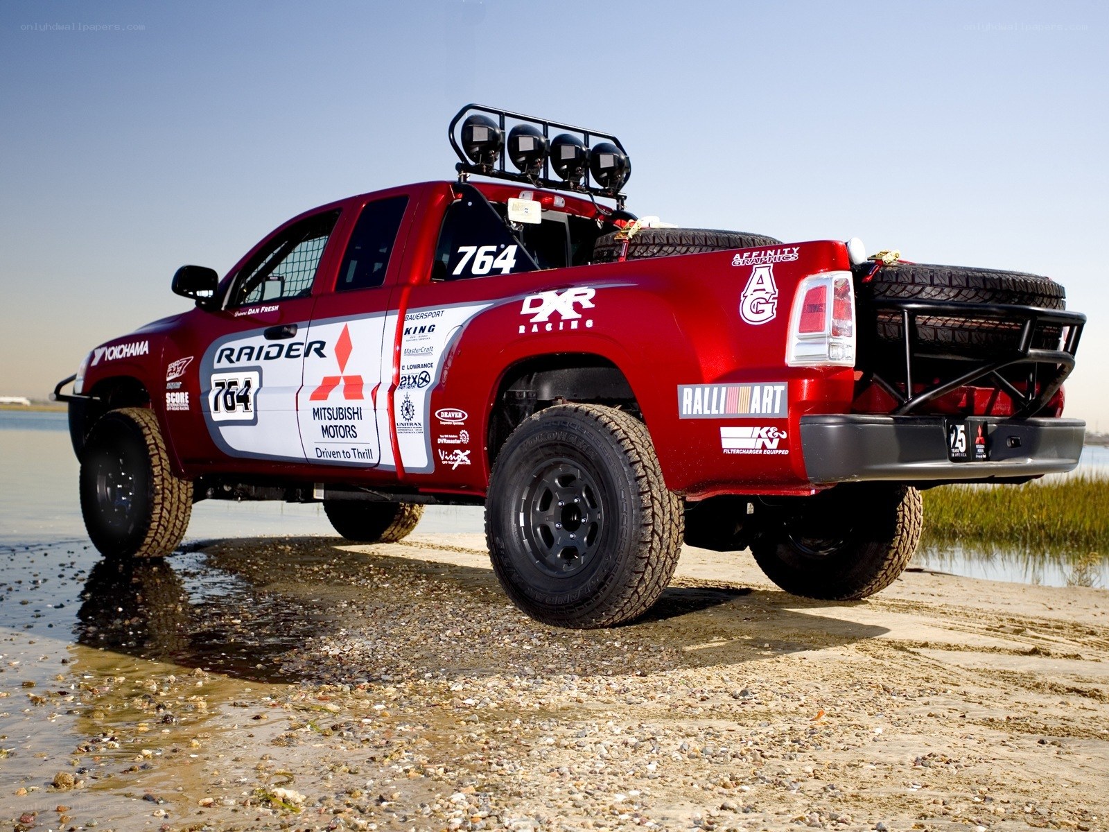 rally raid truck on beach