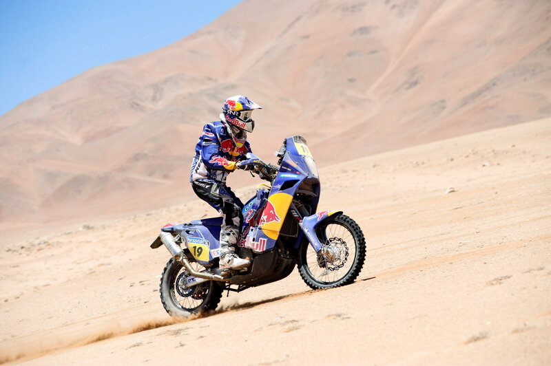 Rally rider on desert terrain