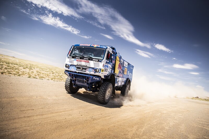 Rally Truck in Desert — Blue, Dynamic, Afternoon, Photograph, Dust, Sky