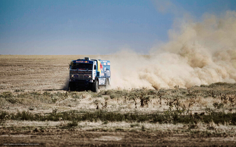 Rally truck in dusty field