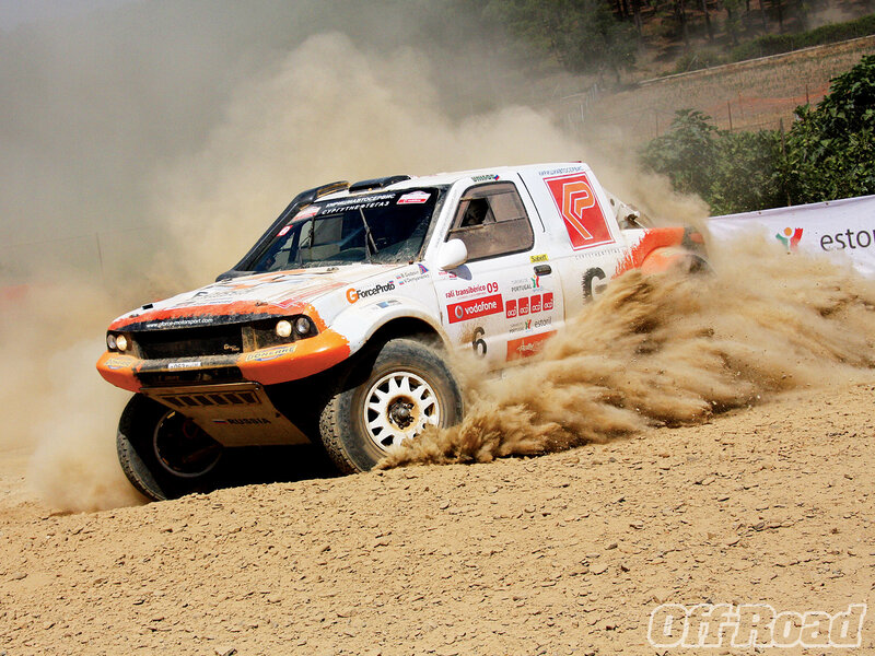Rally Truck Kicking Up Dust — White
