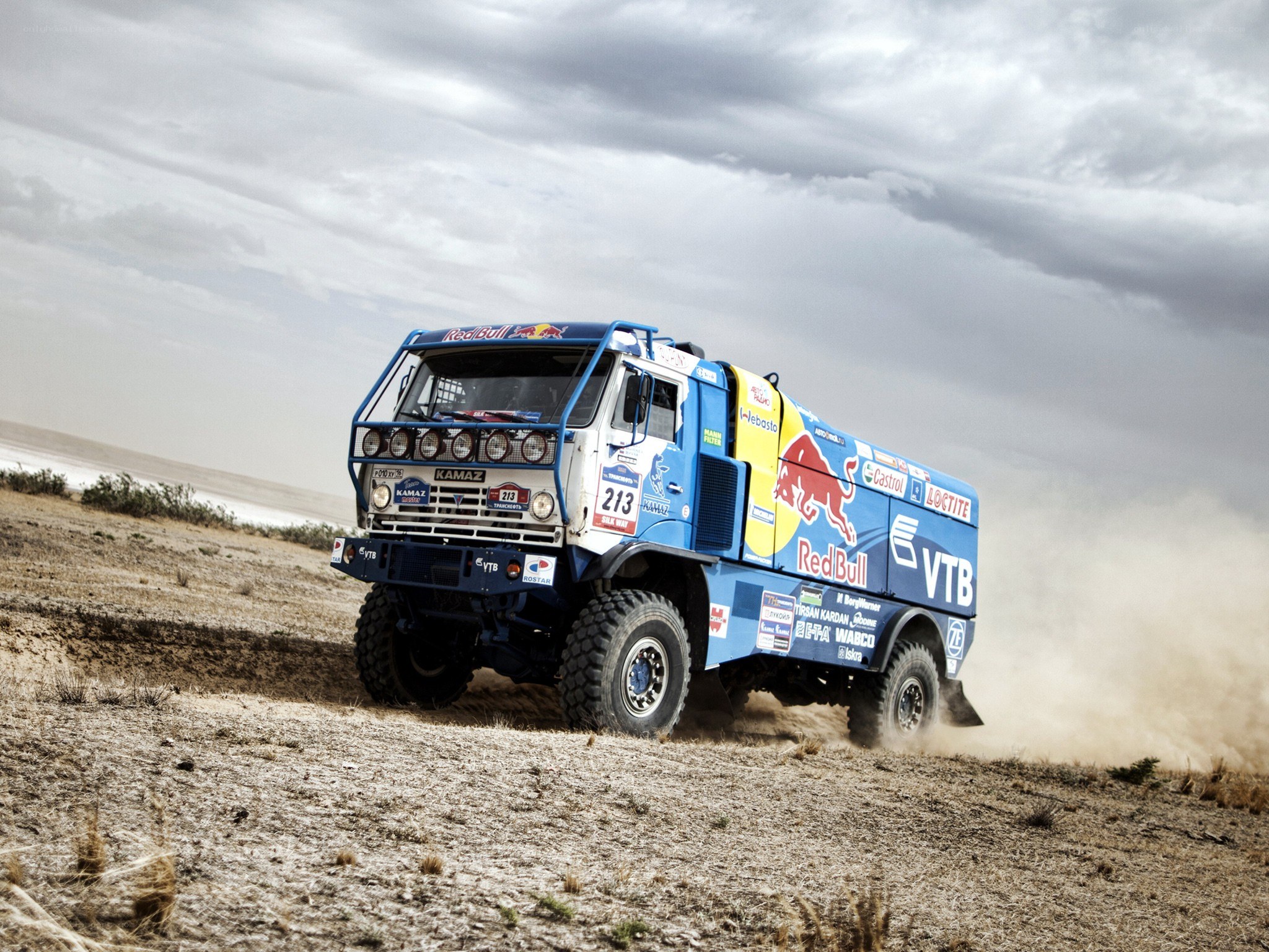 Rally truck on desert terrain