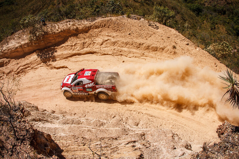 Rally Truck on Dirt — Brown, Dynamic, Afternoon