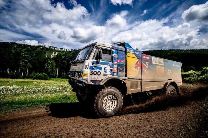 Rally Truck on Dirt Road — Blue, Dynamic, Afternoon, Photograph