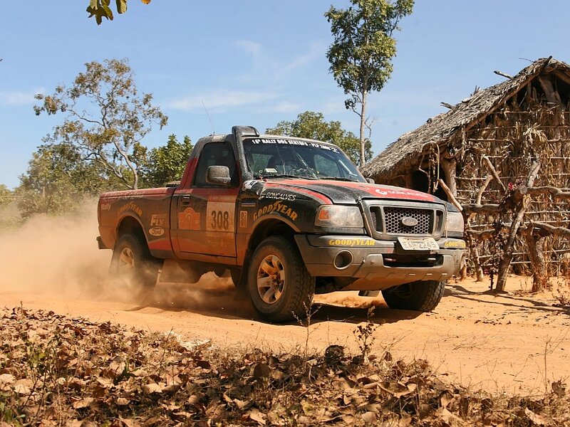 Rally Truck on Dirt Road — Brown, Active
