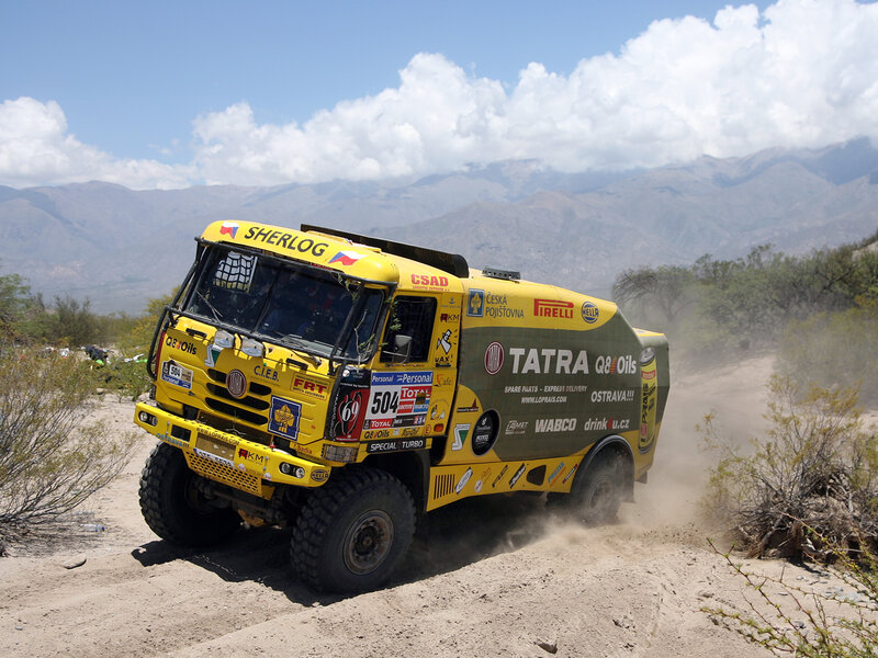 Rally Truck on Dirt Road — Yellow