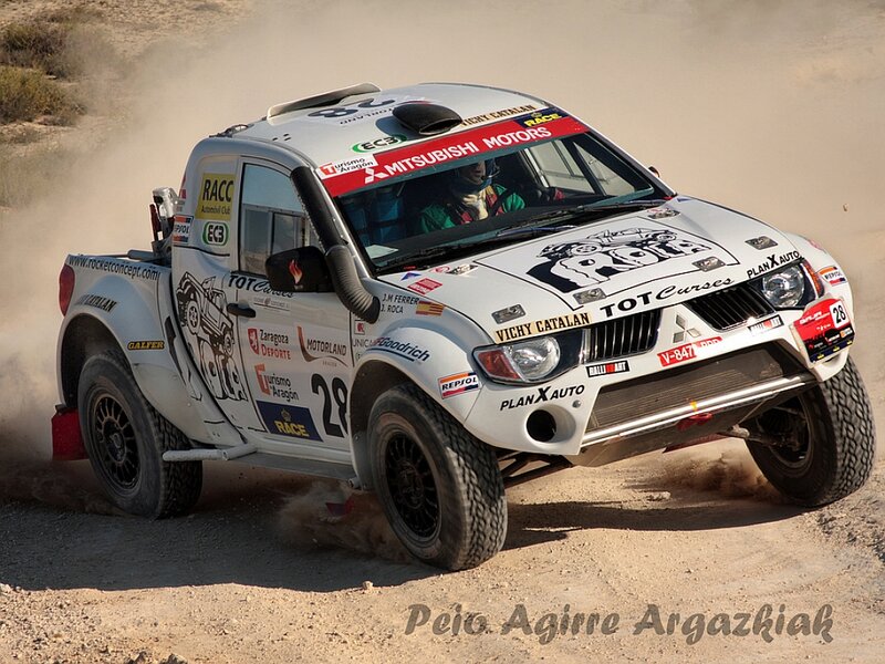 Rally Truck on Dirt — White, Dynamic, Afternoon, Photograph