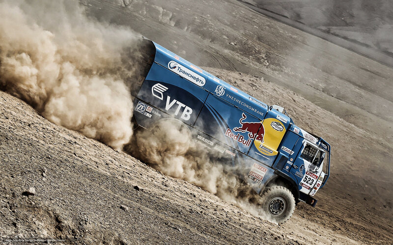 Rally truck on dusty terrain