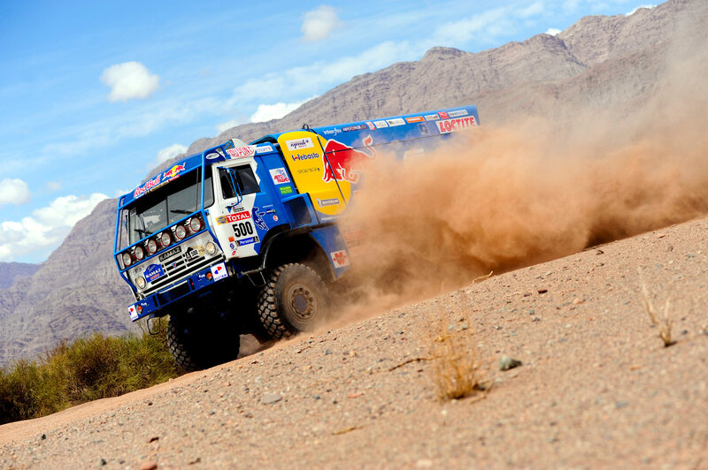 Rally truck on dusty terrain