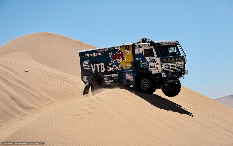 Rally truck on sand dune