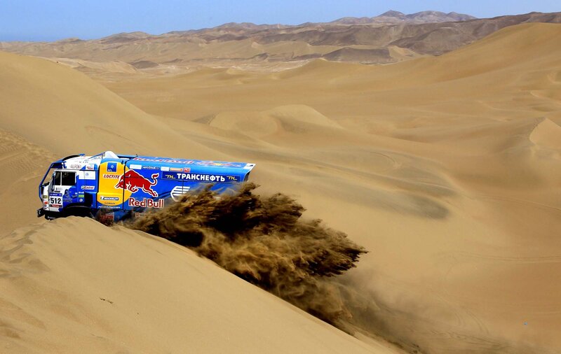 Rally truck on sand dunes