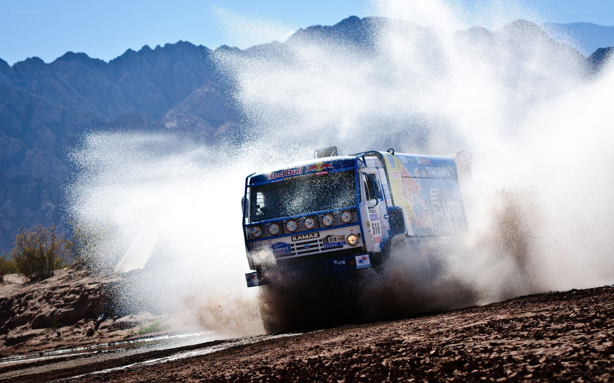 Rally truck splashing water