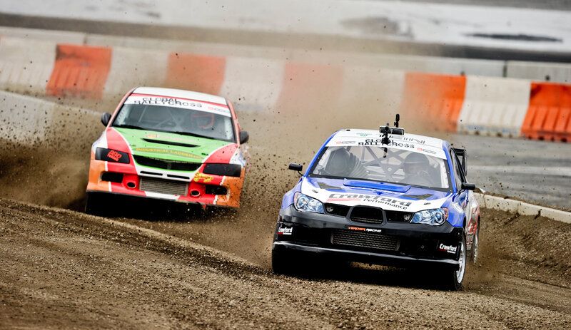 Rallycross cars racing on dirt