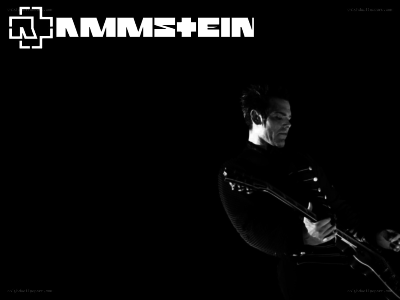 Rammstein guitarist performing