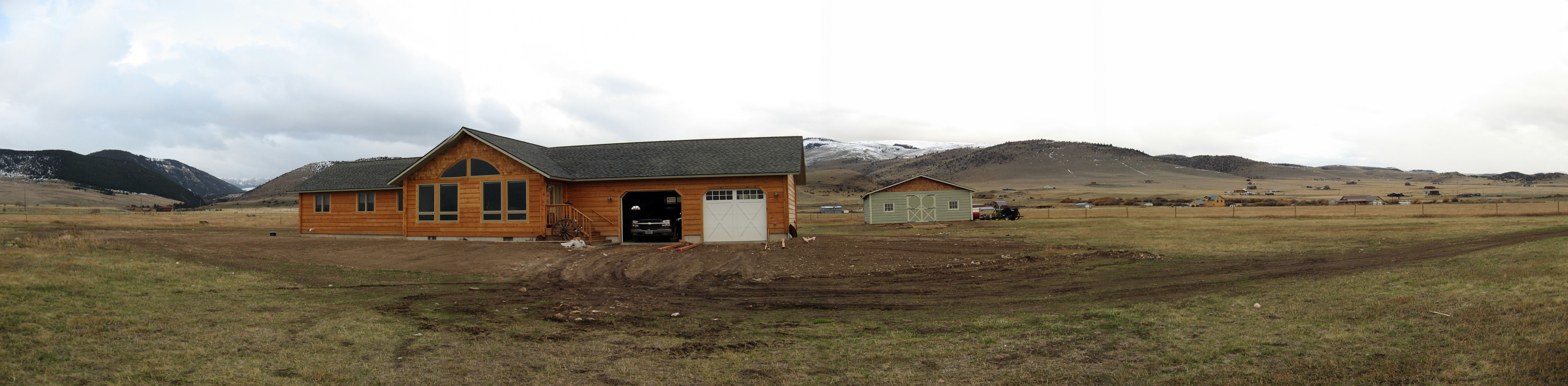 Ranch house in open field