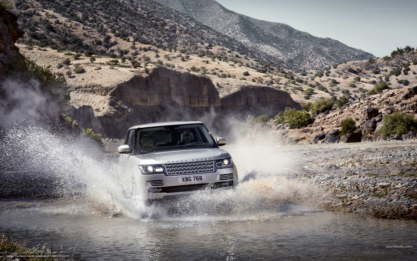 Range Rover crossing a river