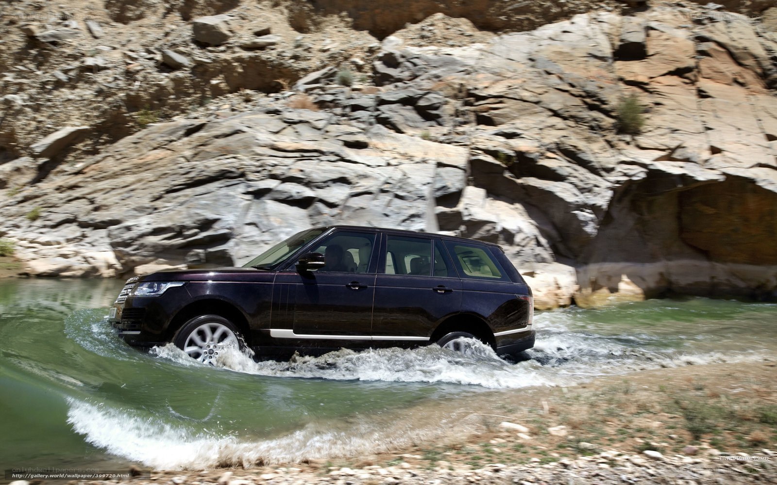 Range Rover crossing river