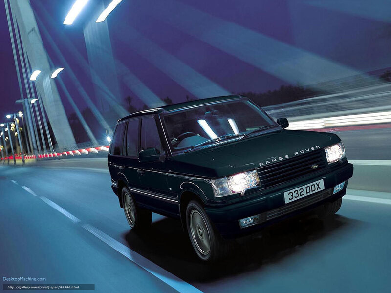 Range Rover driving at night