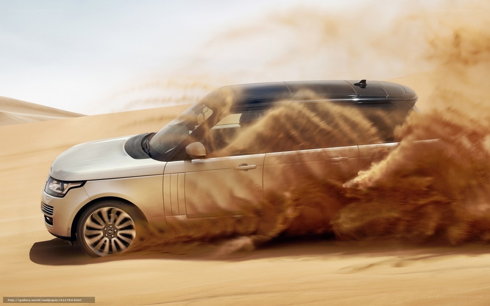 Range Rover in desert sandstorm