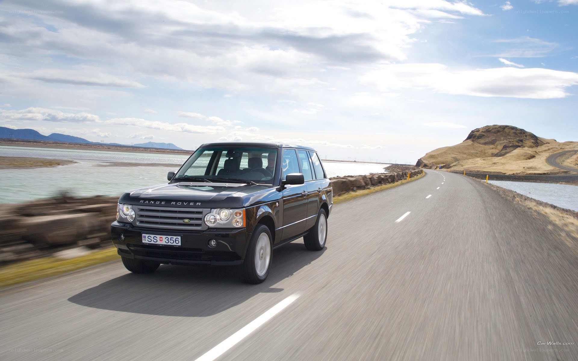 Range Rover on a coastal road