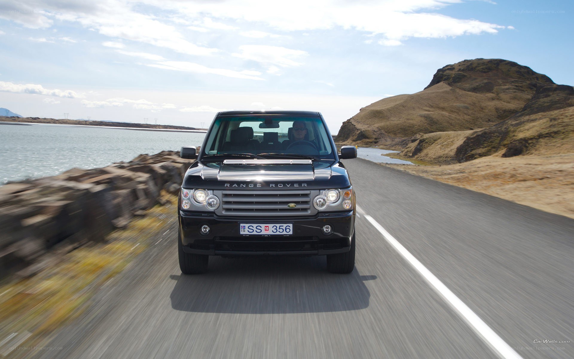 Range Rover on coastal road
