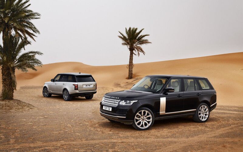 Range Rover SUVs in Desert