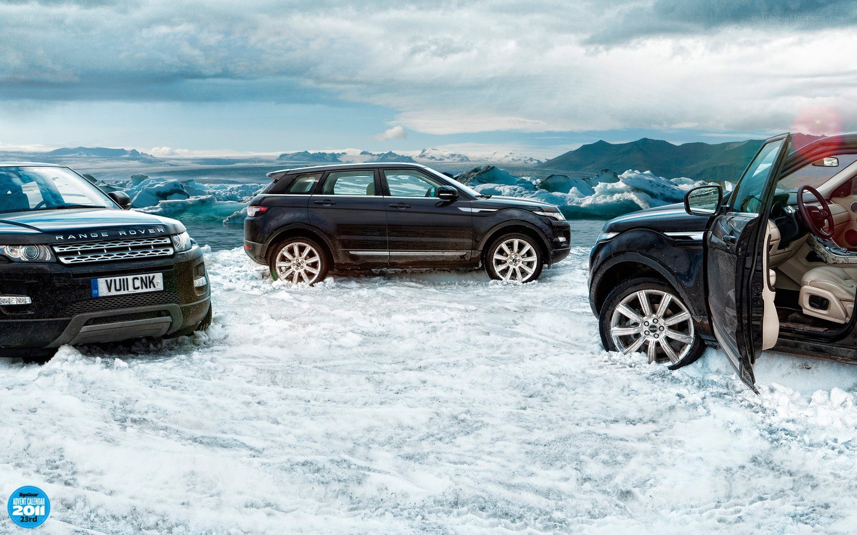 Range Rover SUVs in icy landscape