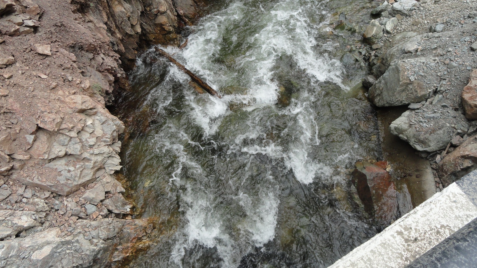 Rapid stream in rocky canyon