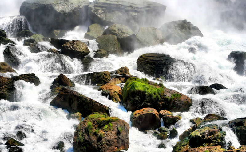 Rapids Flowing over Rocks
