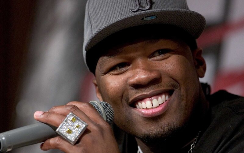 rapper holding microphone