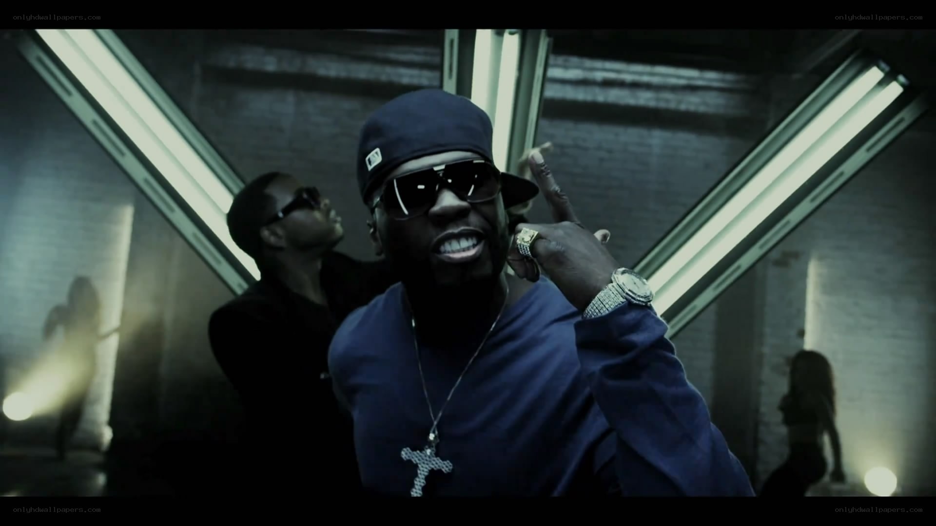 rapper in blue outfit