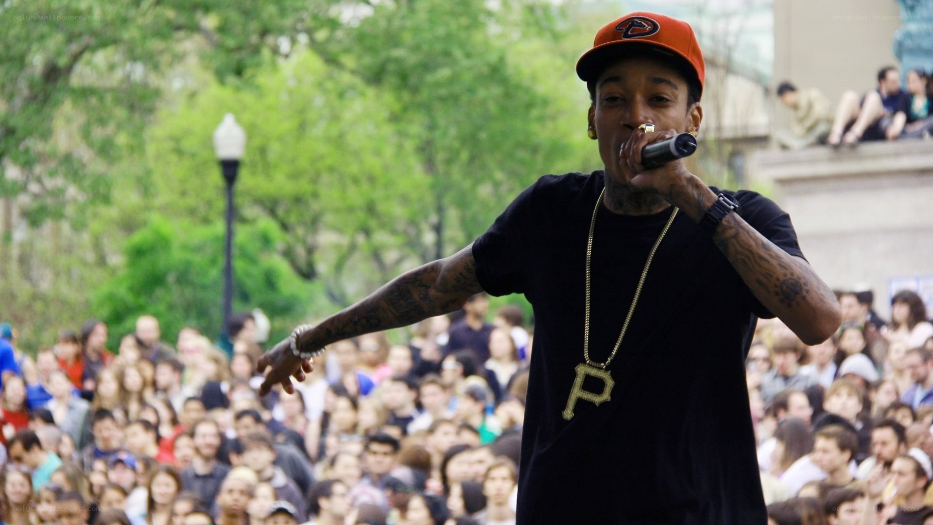 rapper performing at outdoor concert