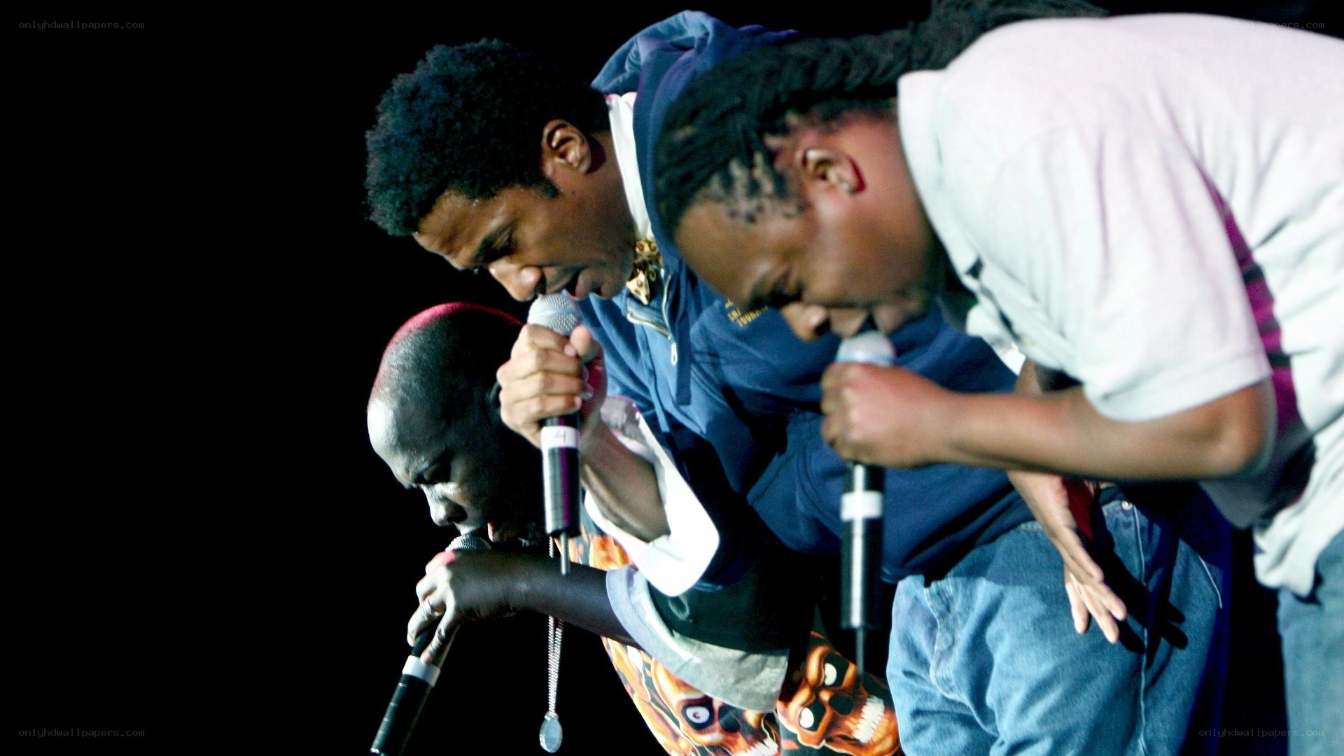rappers performing on stage