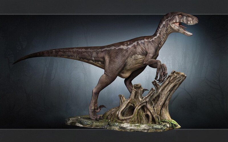 Raptor dinosaur statue